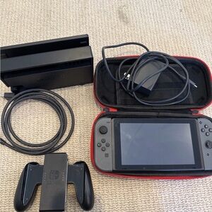 Nintendo Switch Console with Black and Red Accessories